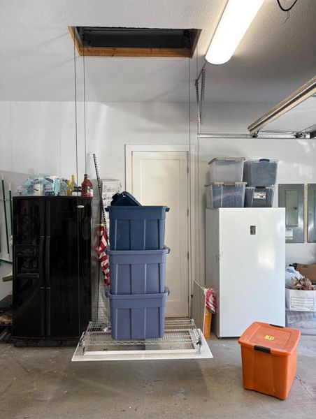 200 pound electric lift to take things from the garage up to the attic or back down