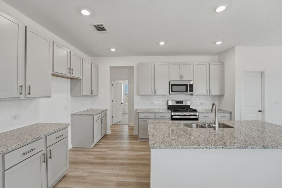 Furnished interior view inside a new home in Longview, Del Valle (Image 4).