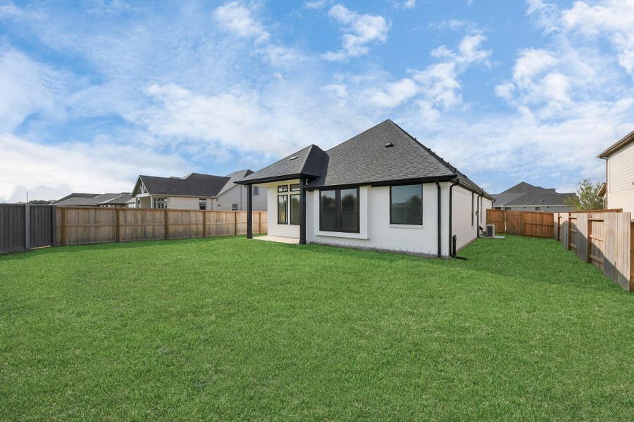 Exterior details and patio area of a home in Arabella on the Prairie: Premier Collection, Richmond (Image 3). Exterior details and patio area of a home in Arabella on the Prairie: Premier Collection, Richmond (Image 3).