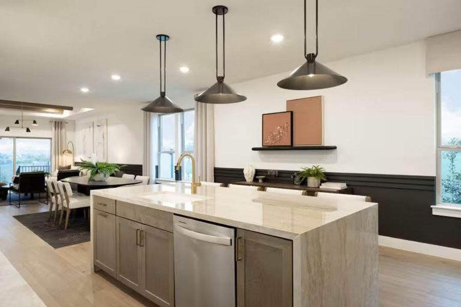 Photo of Pulte model home with same floor plan, not of actual home listed.