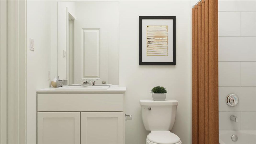 Bathroom with vanity and toilet