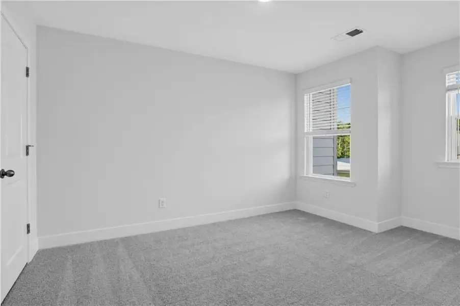 Spacious, unfurnished interior of a new home in Towns at Holly Springs, Holly Springs (Image 23).