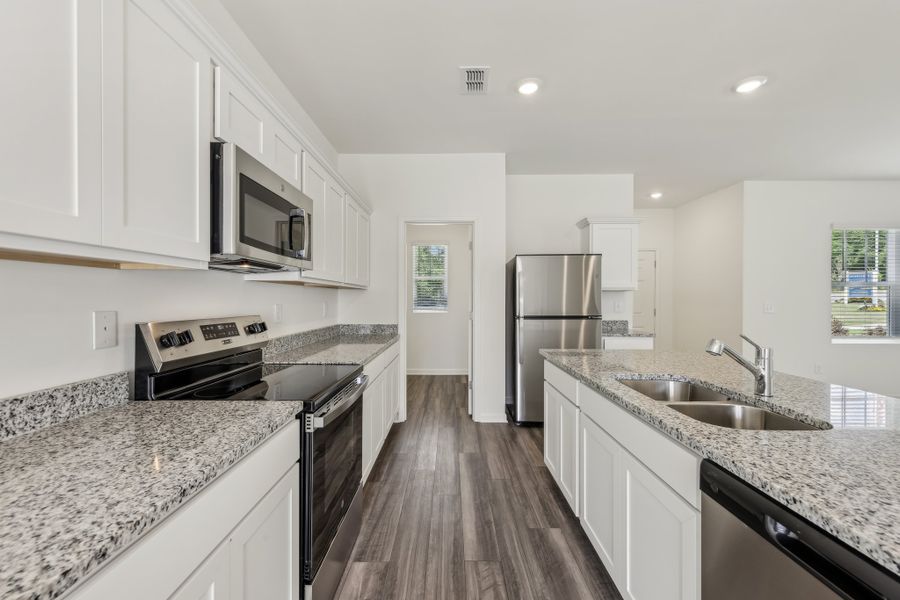 Representative furnished interior of a home built from the Neptune by Starlight Homes in Castlewood South, Taylor (Image 10). Representative furnished interior of a home built from the Neptune by Starlight Homes in Castlewood South, Taylor (Image 10).