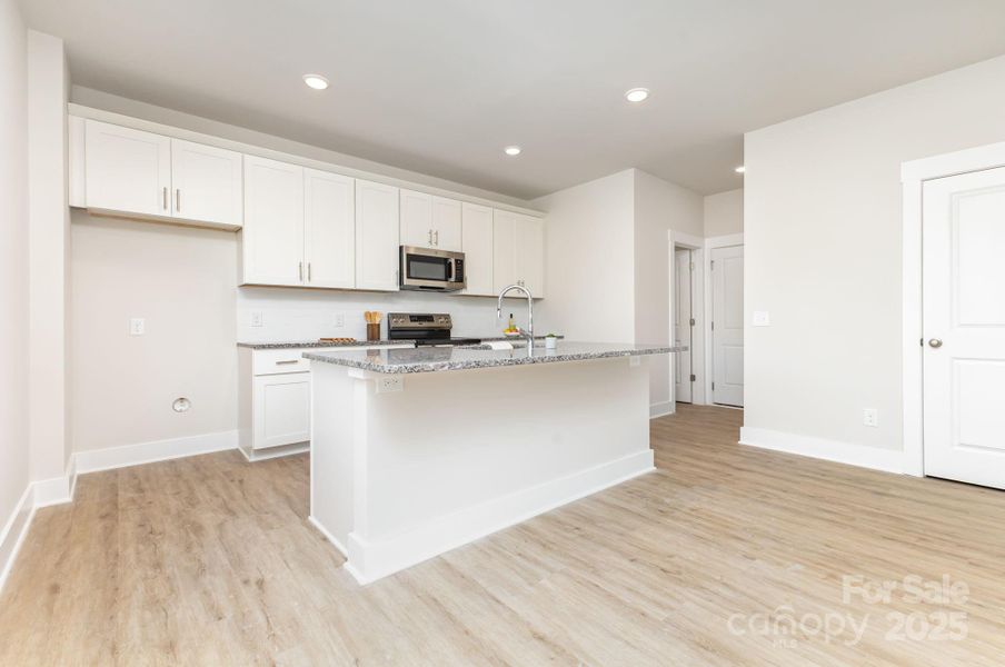 Furnished interior view inside a new home in , Mooresville (Image 6).