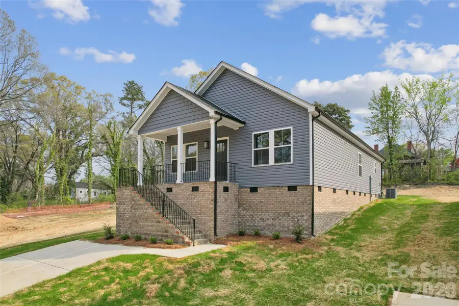 Front exterior of a new home in , Spencer, NC, highlighting curb appeal (Image 1). Front exterior of a new home in , Spencer, NC, highlighting curb appeal (Image 1).