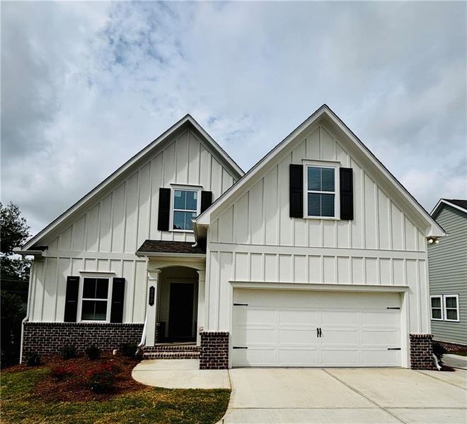 Front exterior of a new home in , Marietta, GA, highlighting curb appeal (Image 1). Front exterior of a new home in , Marietta, GA, highlighting curb appeal (Image 1).
