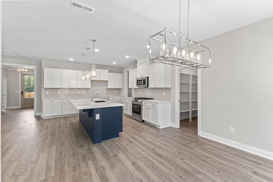 Representative furnished interior of a home built from the The Whitley by RobuckHomes in Baylee Ridge, Selma (Image 18).