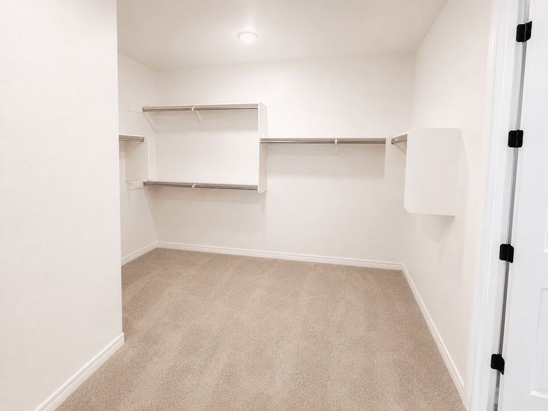 Spacious, unfurnished interior of a new home in The Grove at El Cidro, Goodyear (Image 9).