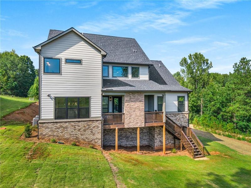 Front exterior of a new home in , Jefferson, GA, highlighting curb appeal (Image 19).