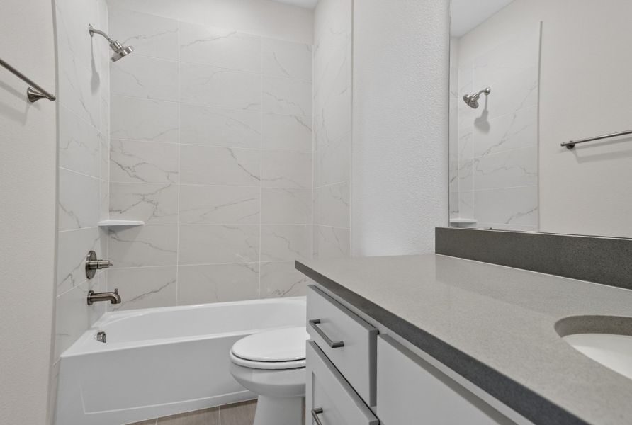 Furnished interior view inside a new home in The Tribute, The Colony (Image 33).