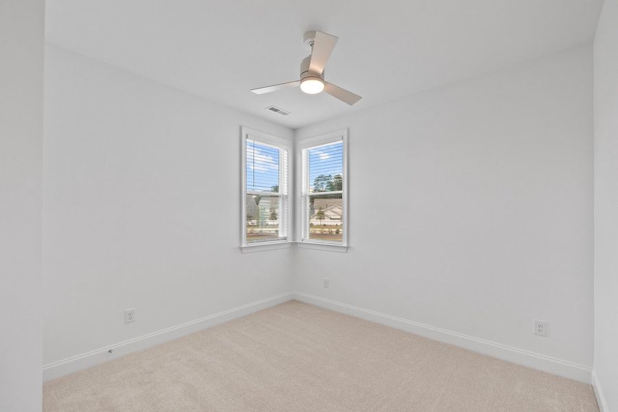 Representative unfurnished interior of a home built from the The Juniper by RobuckHomes in Kennebec Crossing, Angier (Image 81).