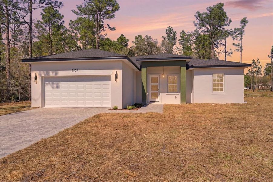 Front exterior of a new home in , Citrus Springs, FL, highlighting curb appeal (Image 2). Front exterior of a new home in , Citrus Springs, FL, highlighting curb appeal (Image 2).