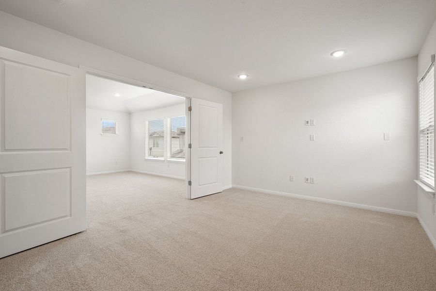 Spacious, unfurnished interior of a new home in The Hills of Bear Creek, Manchaca (Image 36).