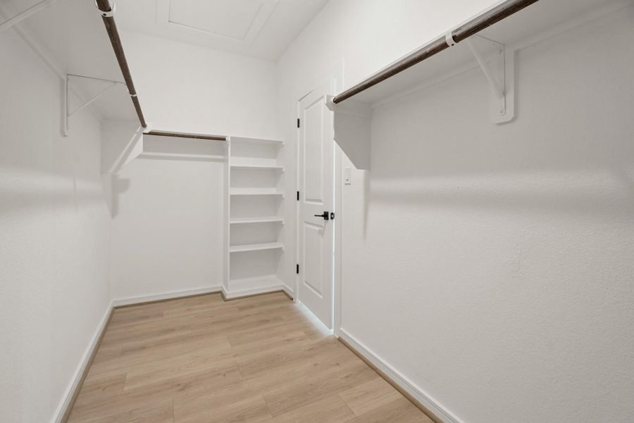 Primary walk-in closet (*Photo not of actual home and used for illustration purposes only.) Primary walk-in closet (*Photo not of actual home and used for illustration purposes only.)
