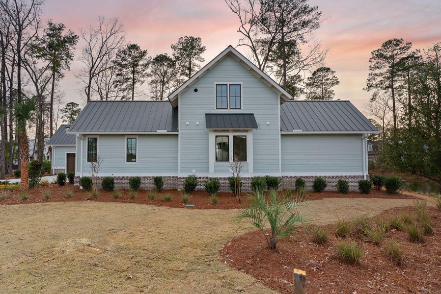 Front exterior of a new home in , Ravenel, SC, highlighting curb appeal (Image 31).