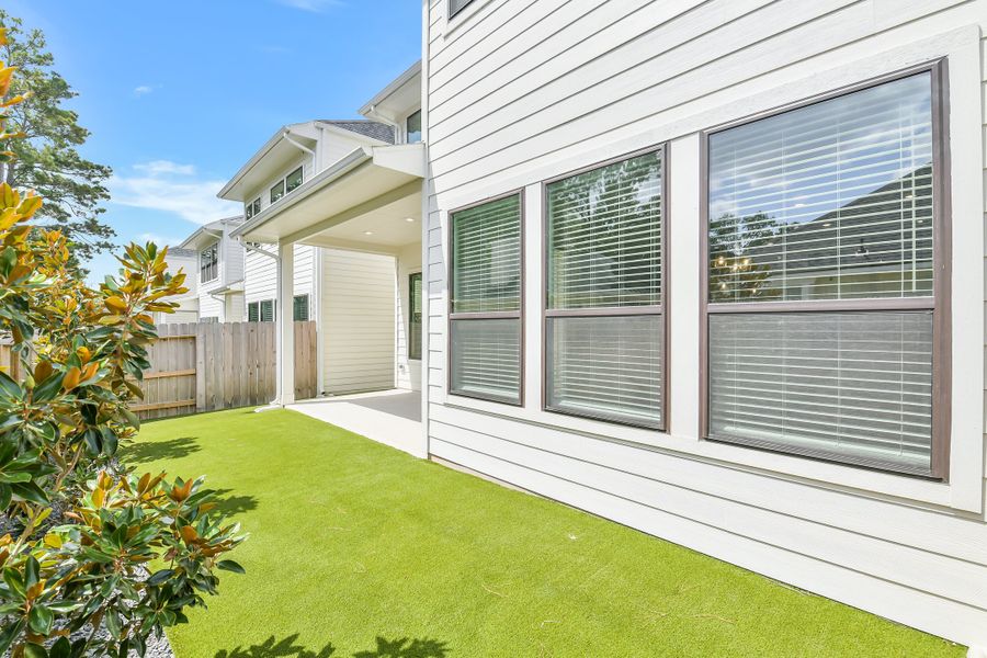 Exterior details and patio area of a home in Summer Place  35', Montgomery (Image 31).