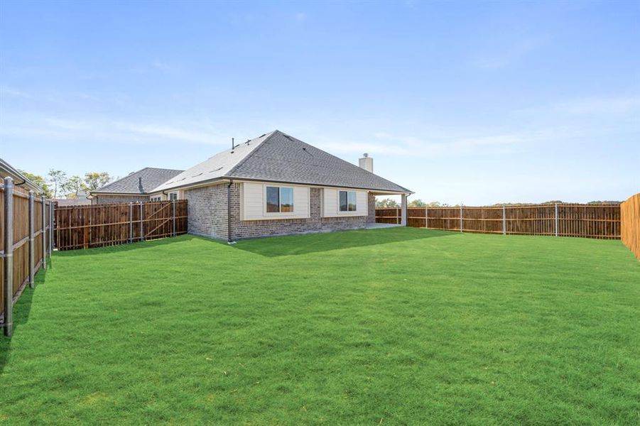 Exterior details and patio area of a home in Meadow Vista 60-65, Anna (Image 3). Exterior details and patio area of a home in Meadow Vista 60-65, Anna (Image 3).