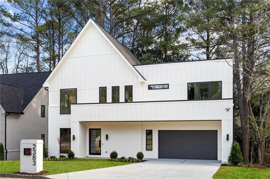 Front exterior of a new home in , Brookhaven, GA, highlighting curb appeal (Image 2). Front exterior of a new home in , Brookhaven, GA, highlighting curb appeal (Image 2).