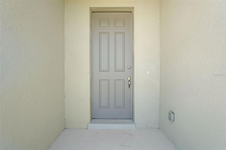 Exterior details and patio area of a home in Willowbrook North, Winter Haven (Image 22).