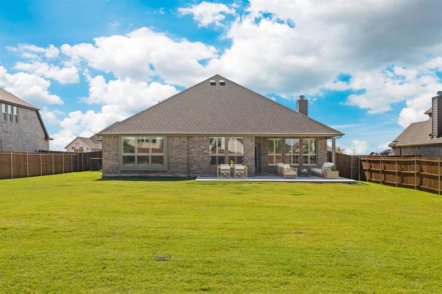 Exterior details and patio area of a home in Lovers Landing, Forney (Image 22).