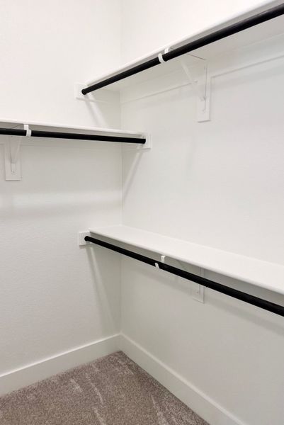 Representative unfurnished interior of a home built from the Amherst by Pulte Homes in Whitewing Trails, Princeton (Image 18).