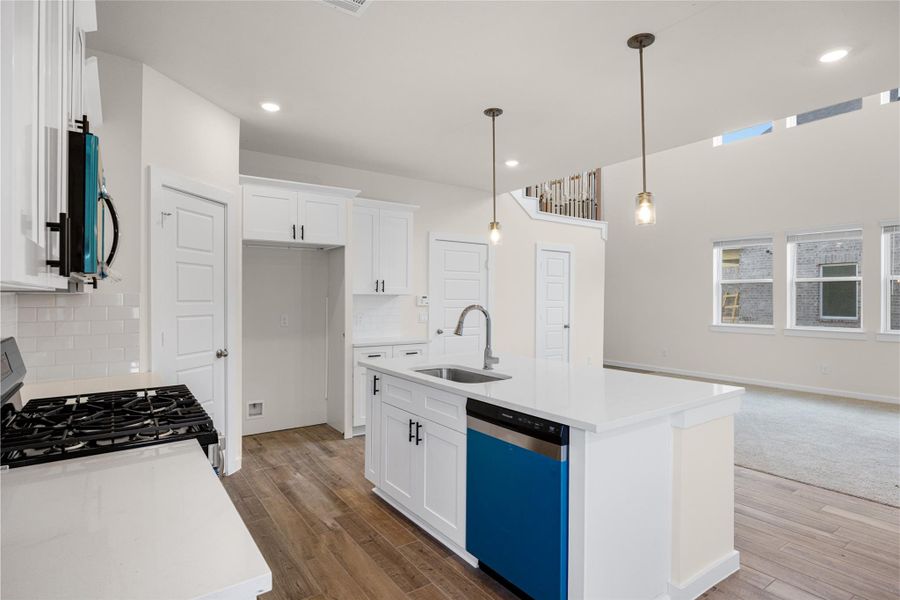 Furnished interior view inside a new home in Creekhaven, Iowa Colony (Image 7).