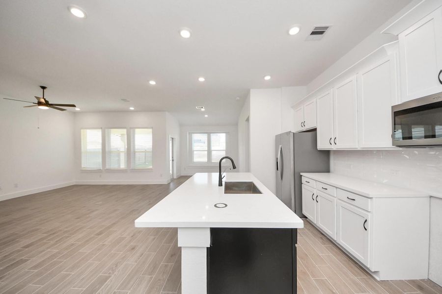 Furnished interior view inside a new home in Sunterra: Landmark Collection, Katy (Image 7).