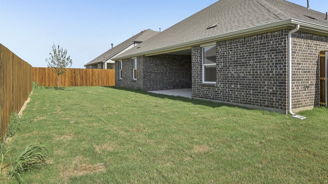 Exterior details and patio area of a home in Silverado, Aubrey (Image 3).