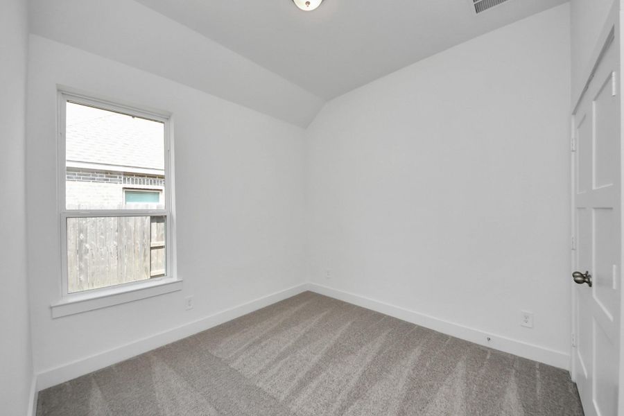 Spacious, unfurnished interior of a new home in Amira: Premier Collection, Tomball (Image 23).