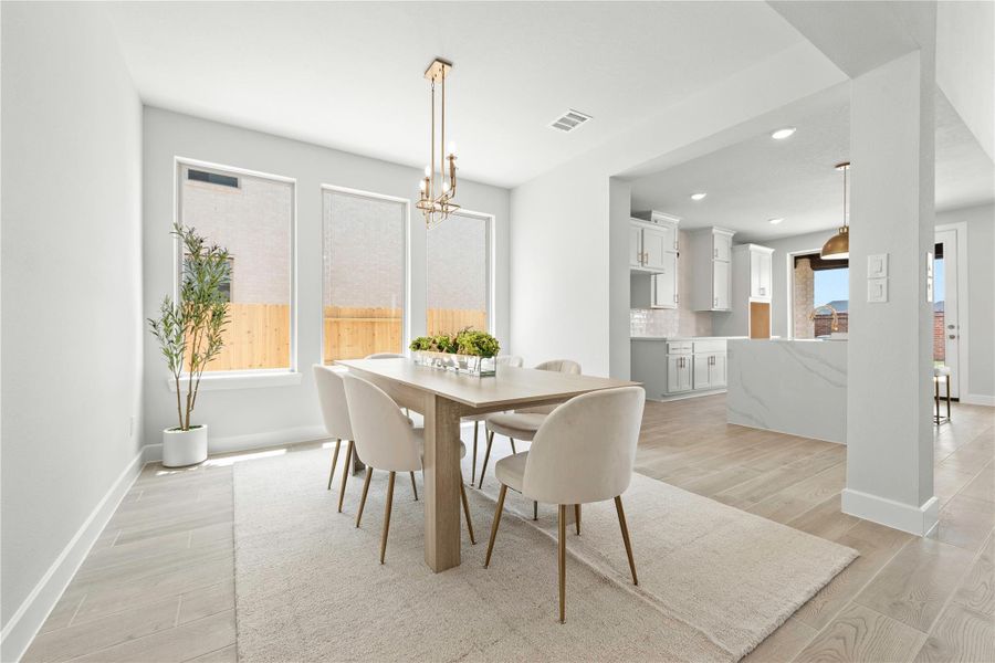 Furnished interior view inside a new home in Sunterra, Katy (Image 4).