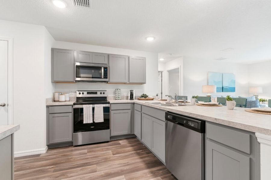 Representative furnished interior of a home built from the Alexander by Holiday Builders in Poinciana, Poinciana (Image 4).