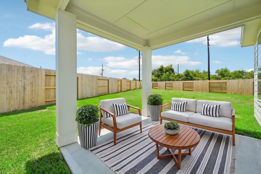 Exterior details and patio area of a home in Heights of Barbers Hill, Baytown (Image 29).