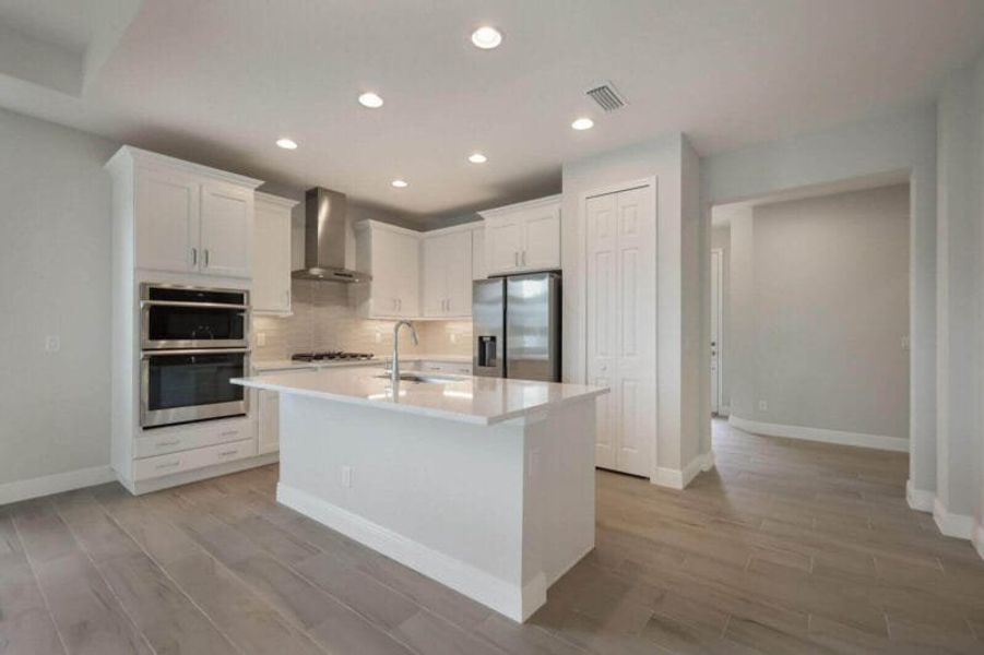 Furnished interior view inside a new home in Reflection Villas at Watercolor Place, Bradenton (Image 6).