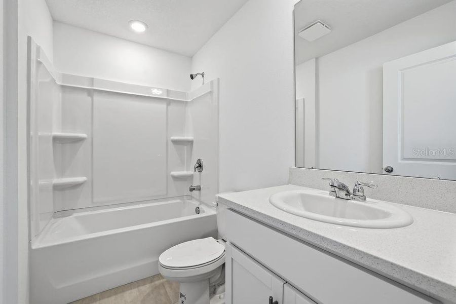 Furnished interior view inside a new home in The Towns at Firethorn, Parrish (Image 15).