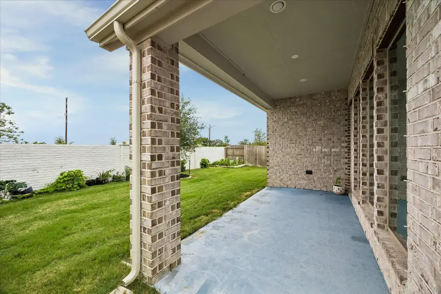Exterior details and patio area of a home in Valencia, Manvel (Image 2). Exterior details and patio area of a home in Valencia, Manvel (Image 2).