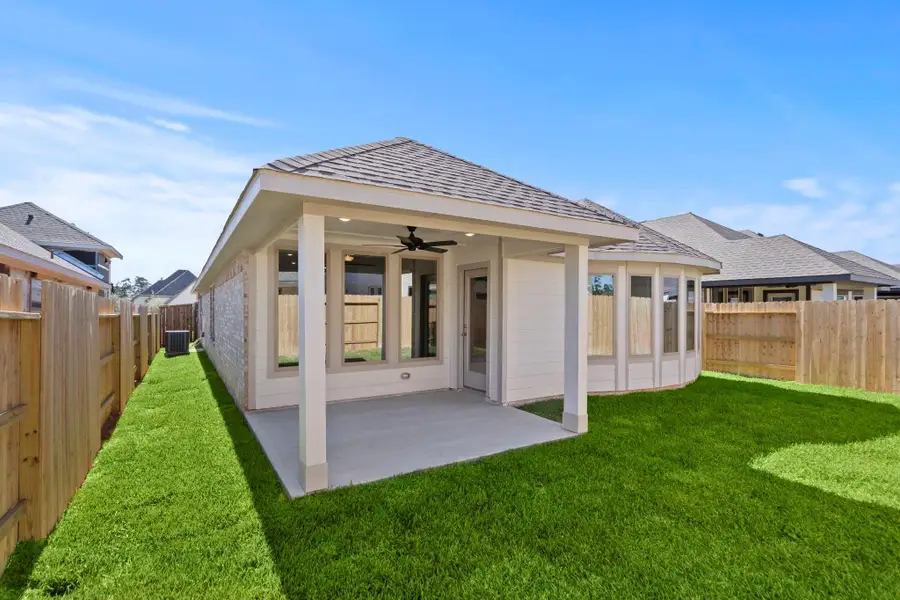 Exterior details and patio area of a home in Grand Central Park, Conroe (Image 4). Exterior details and patio area of a home in Grand Central Park, Conroe (Image 4).