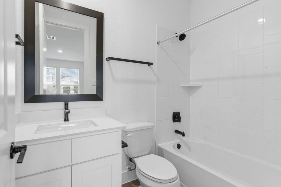 Furnished interior view inside a new home in , League City (Image 16).