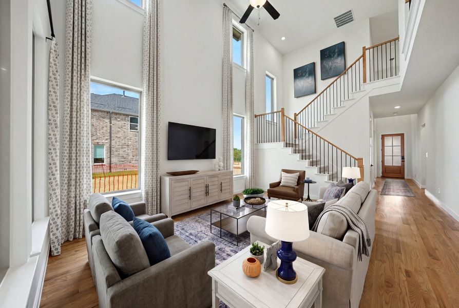 Furnished interior view inside a new home in Light Farms Brenham - 40' Lots, Celina (Image 12).