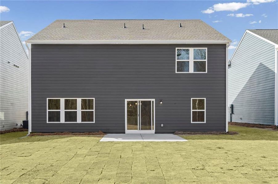 Exterior details and patio area of a home in Twin Lakes, Hoschton (Image 20).