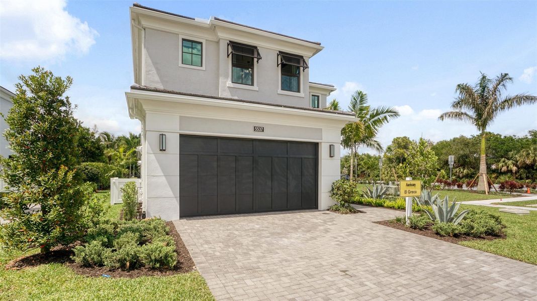 Front exterior of a new home in Artistry Palm Beach, Palm Beach, FL, highlighting curb appeal (Image 2).