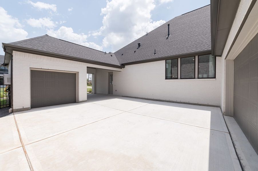 Representative exterior details of a home built from the Carignan by Tri Pointe Homes in Woodson’s Reserve, Spring (Image 25).