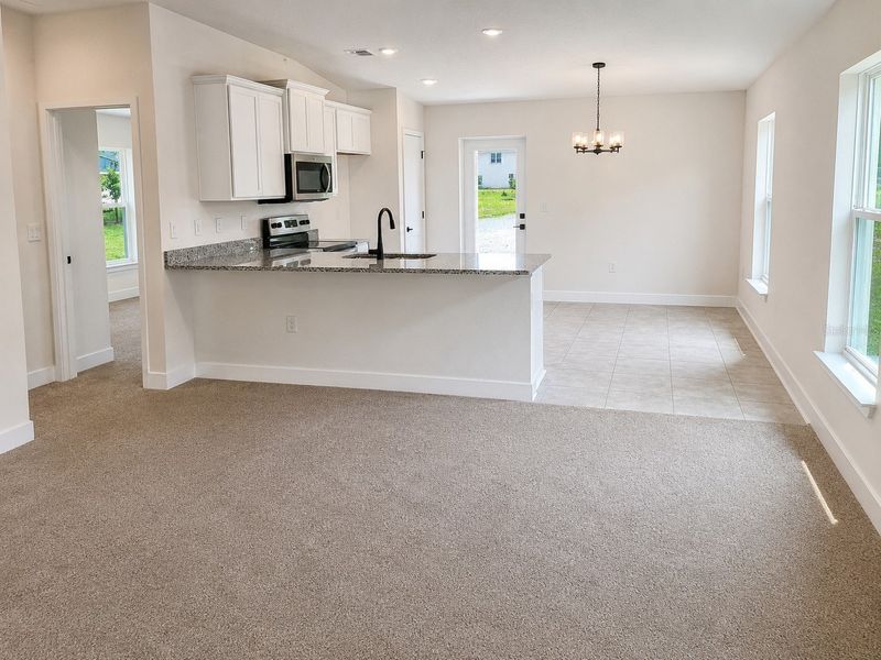 Spacious, unfurnished interior of a new home in Harmony Central, St. Cloud (Image 6).