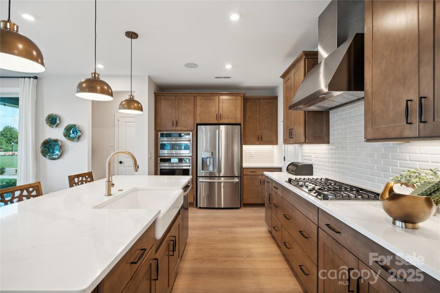 Gourmet kitchen layout designed to inspire. *Model Photos | actual finishes, structural selections, and orientation may vary.