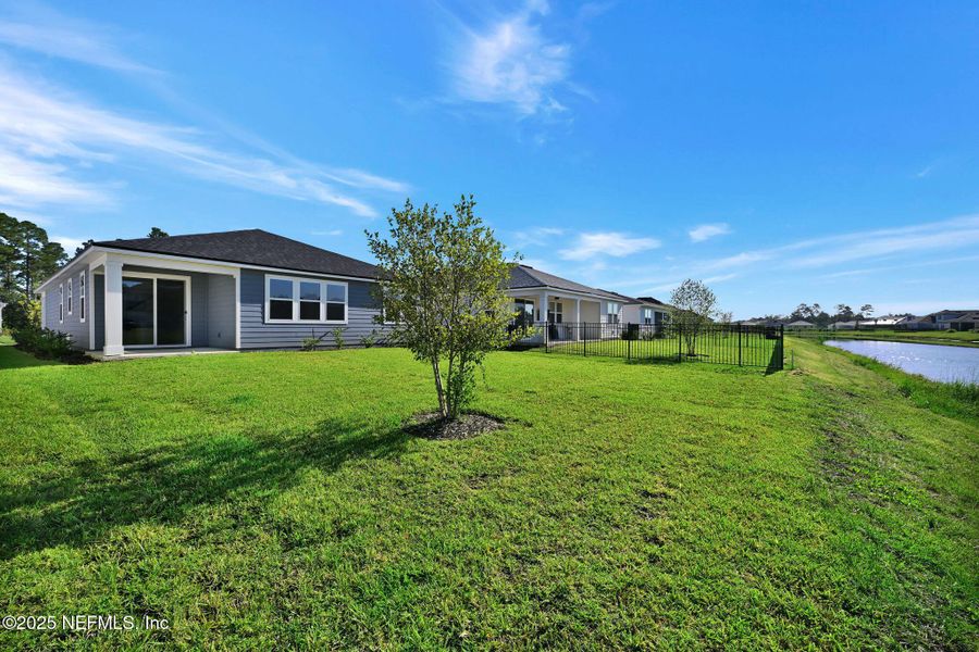 Front exterior of a new home in Hyland Trail, Green Cove Springs, FL, highlighting curb appeal (Image 21). Front exterior of a new home in Hyland Trail, Green Cove Springs, FL, highlighting curb appeal (Image 21).