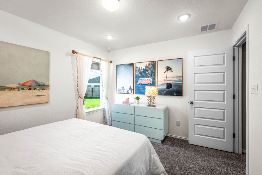 These are the secondary bedrooms of the Hawkins plan and is the model home in Carillon at 13305 Eppright Trace Blvd., Manor, TX. These are the secondary bedrooms of the Hawkins plan and is the model home in Carillon at 13305 Eppright Trace Blvd., Manor, TX.
