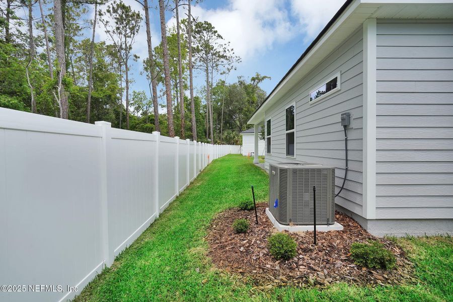 Exterior details and patio area of a home in Landing at Olde Florida, St. Augustine (Image 3).