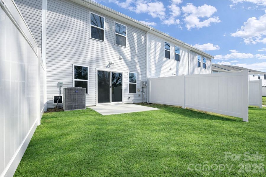 Exterior details and patio area of a home in , Charlotte (Image 2). Exterior details and patio area of a home in , Charlotte (Image 2).