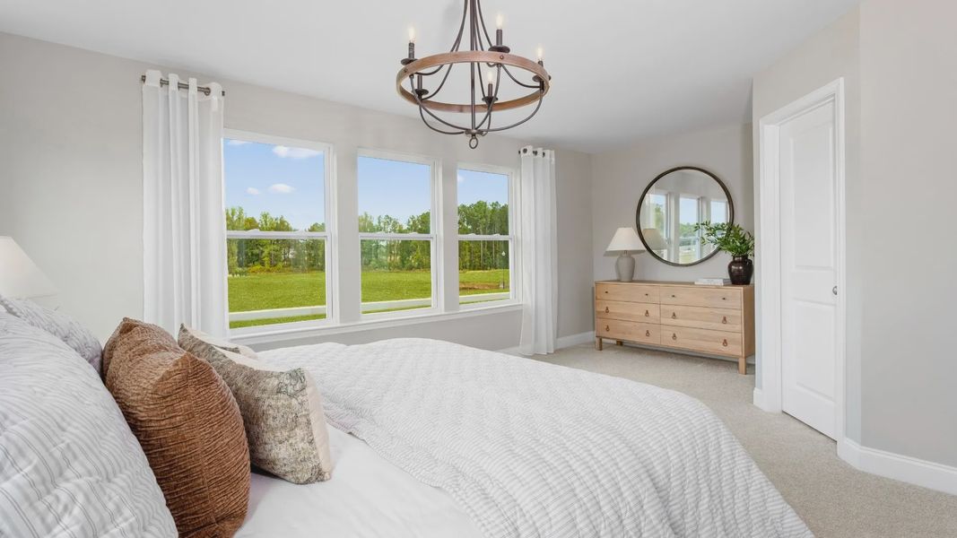 Furnished interior view inside a new home in Kensley Grove, Fuquay Varina (Image 10). Furnished interior view inside a new home in Kensley Grove, Fuquay Varina (Image 10).