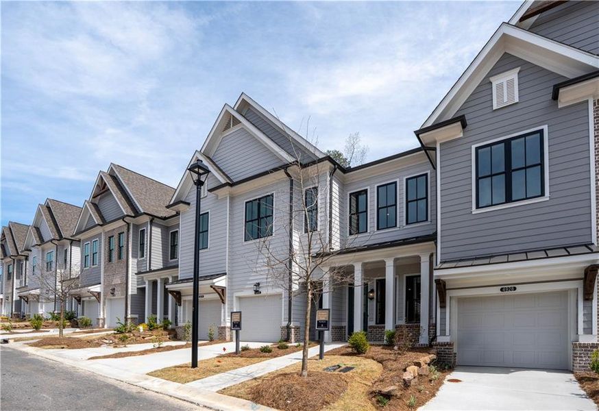 Front exterior of a new home in Waterside Condos, Peachtree Corners, GA, highlighting curb appeal (Image 22).