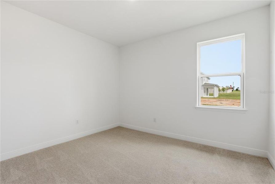 Spacious, unfurnished interior of a new home in Vintner Reserve, Clermont (Image 25).